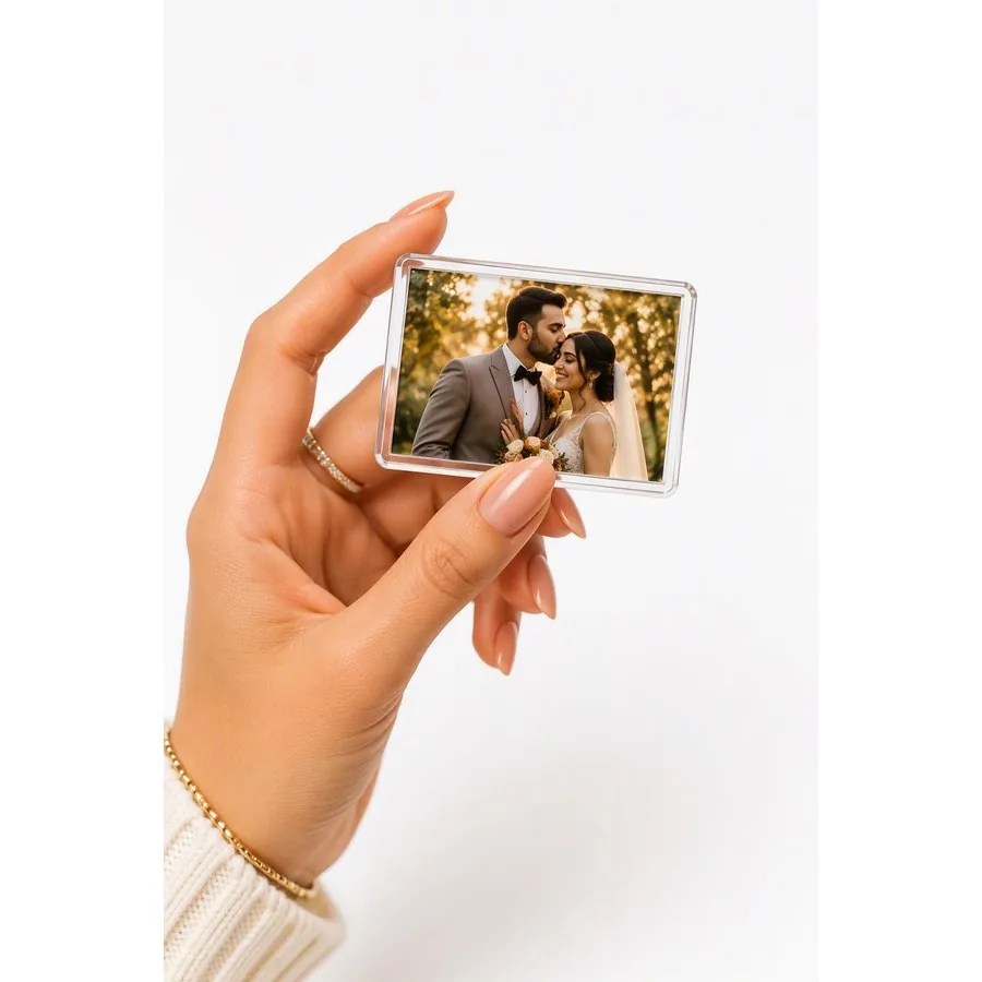 Wedding couple photo magnet, held in hand